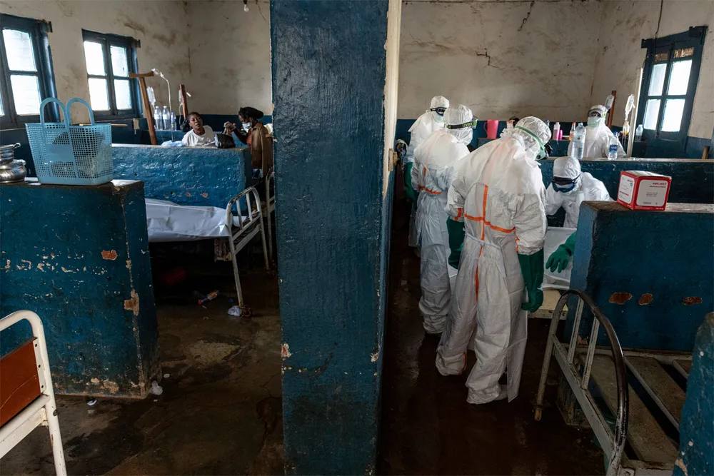Health workers in full protective equipment inside an Ebola treatment ward in the Democratic Republic of Congo (file photo, May 2026)