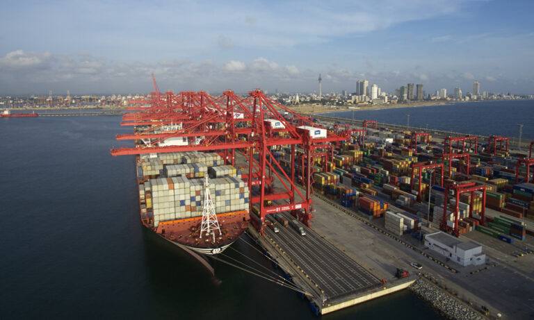 Container cranes and berthed ships at the Colombo International Container Terminal in Sri Lanka's Colombo Port