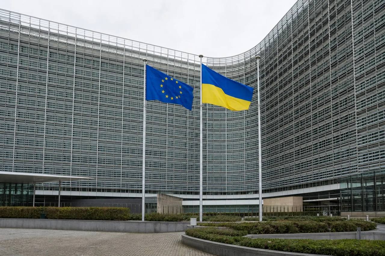 EU and Ukrainian flags outside the European Commission in Brussels