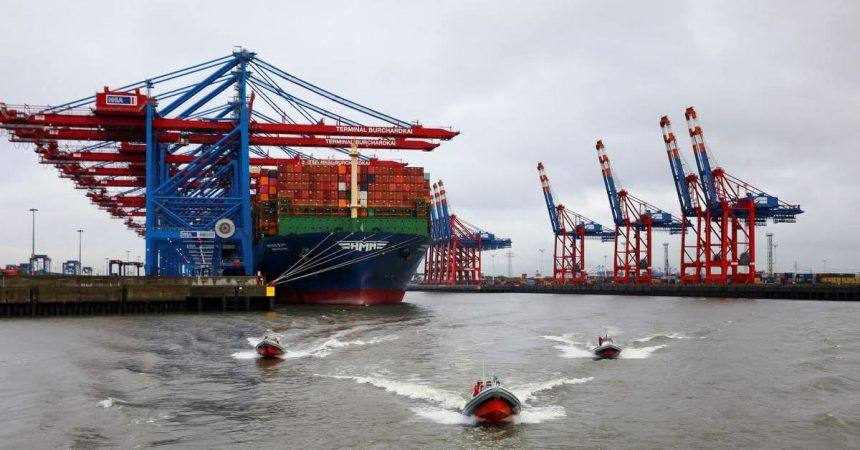 A container ship docked at the Burchardkai container terminal in the Port of Hamburg, Germany