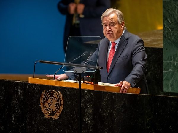 UN Secretary-General Antonio Guterres speaking at a United Nations podium