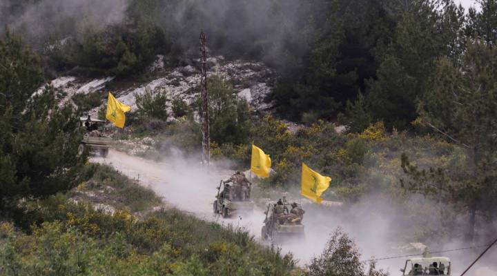 Hezbollah members taking part in a military exercise during a media tour in Aaramta, Lebanon