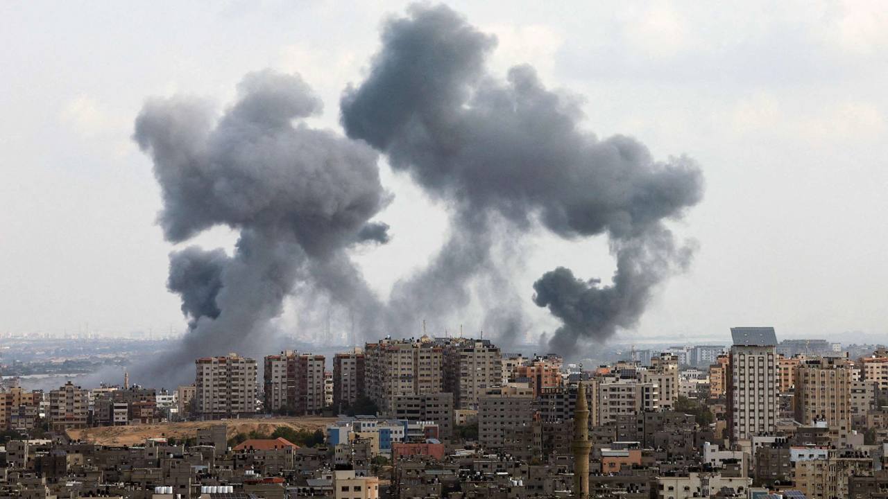 Smoke rising over buildings in Gaza during the war