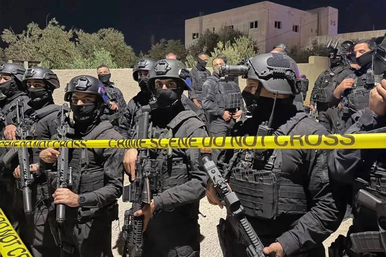 Jordanian security forces guarding an area in the village of al-Jadeeda in Karak governorate on 26 October 2026