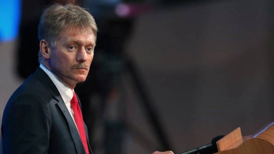 Kremlin spokesman Dmitry Peskov at a podium during a press event, file photo