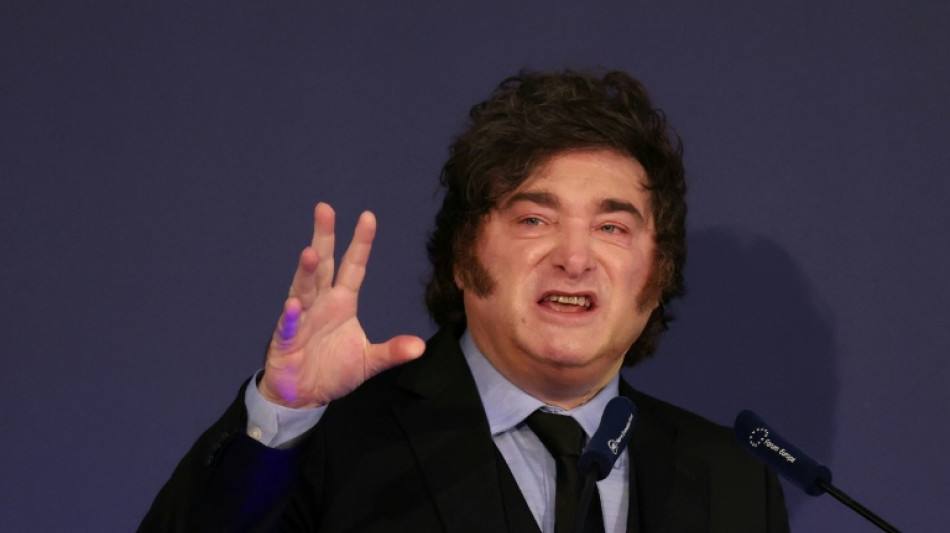 Argentine President Javier Milei speaking at an economic forum in Madrid, where he called Spanish Prime Minister Pedro Sanchez a dictator