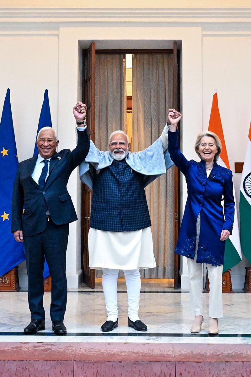 File photo from the January 2026 India-EU summit in New Delhi showing European Council President Antonio Costa, Prime Minister Narendra Modi and European Commission President Ursula von der Leyen raising joined hands between European Union and Indian flags