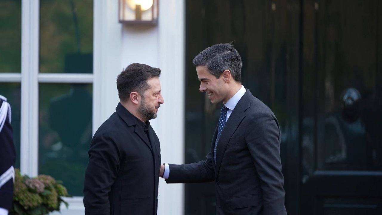 Ukrainian President Volodymyr Zelenskyy, in black, greeted by Dutch Prime Minister Rob Jetten outside a government building in The Hague on October 28, 2026