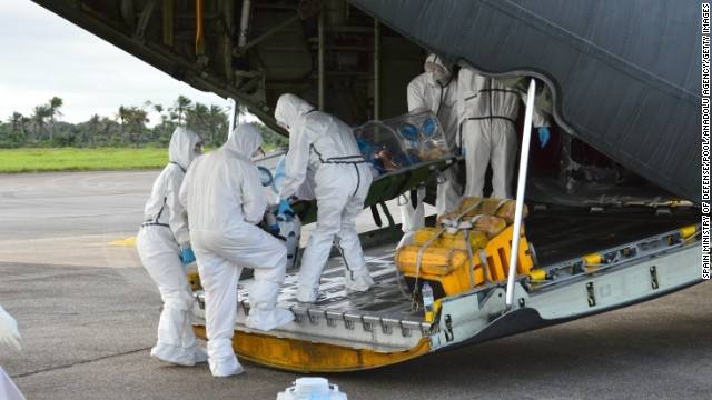 Health workers in protective equipment during an Ebola response in Africa