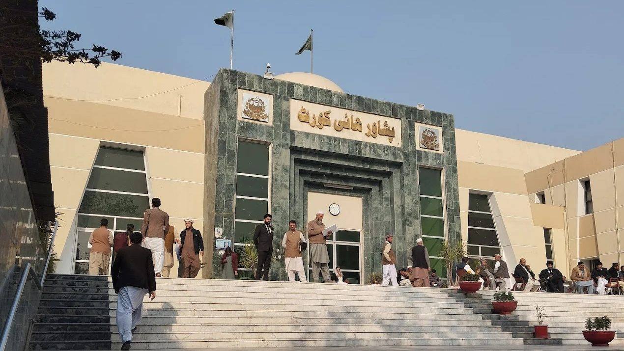 The Peshawar High Court building in Peshawar, Pakistan, with lawyers and visitors on its steps (file photo)