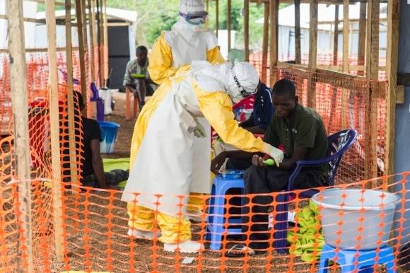 Health workers responding to an Ebola outbreak in Africa