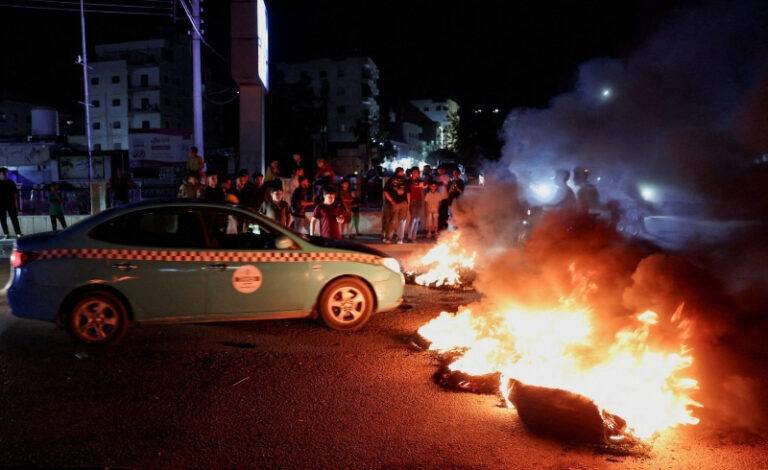 Protesters burn tyres on a highway in Syria during fuel-price protests in September 2026