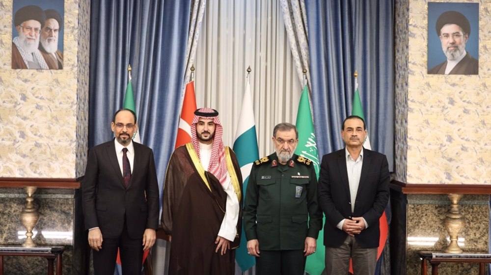 Saudi Defence Minister Prince Khalid bin Salman, Iran's SNSC Secretary Mohsen Rezaei and fellow officials pose ahead of the four-way security meeting in Tehran on October 26, 2026