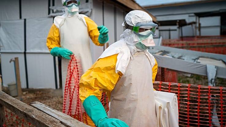 Ebola health workers in full protective equipment at a treatment centre in Congo
