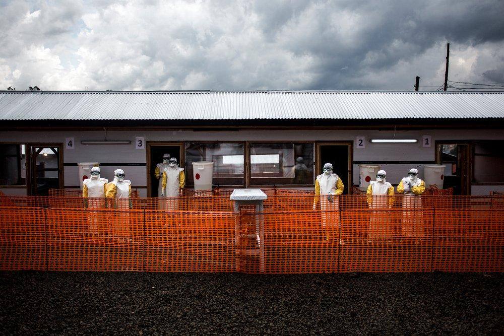 Health workers in protective gear at an Ebola treatment centre in North Kivu, DR Congo