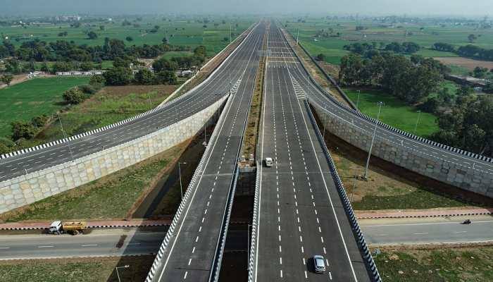 Aerial file photo of the Delhi-Mumbai Expressway in Haryana with wide carriageways and green fields on both sides