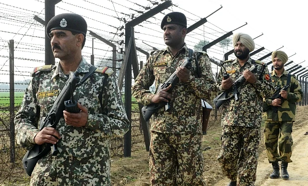 BSF jawans patrolling the India–Pakistan border fence in Punjab