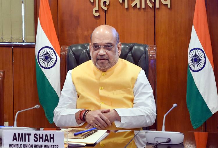 Union Home Minister Amit Shah seated at his desk in the Ministry of Home Affairs, New Delhi