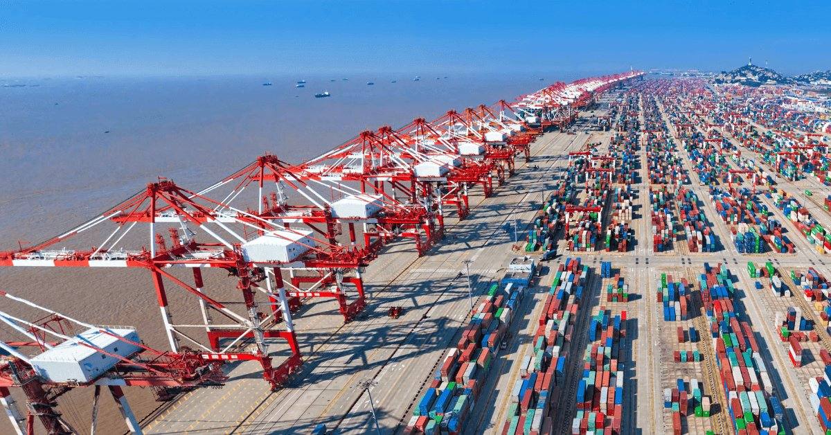 Containers and cranes at Shanghai Port, China