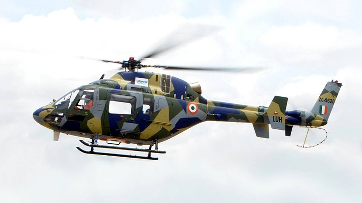HAL Light Utility Helicopter in camouflage in flight against a cloudy sky