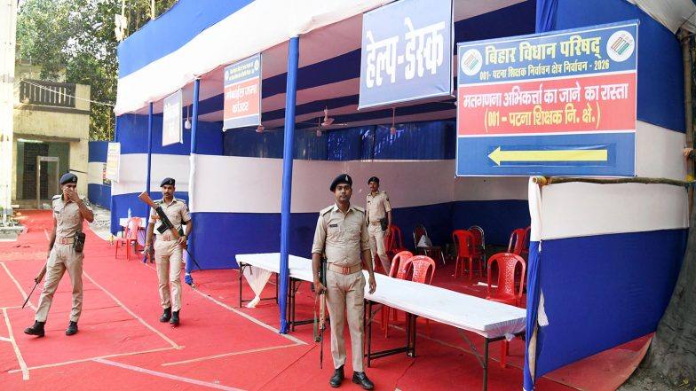Security personnel guard a strongroom in Patna as counting for the Legislative Council elections begins