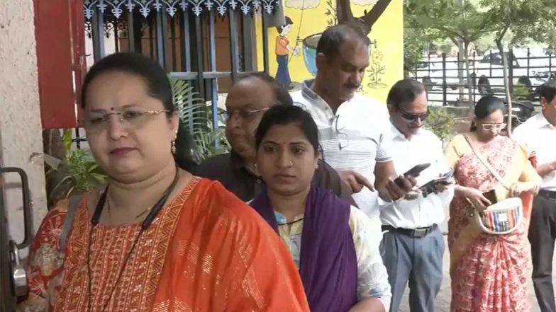 Voters queueing outside a polling booth at NMC Hindi School, Vivekanand Nagar, Nagpur, during the Legislative Council elections on October 23, 2026 (Photo: ANI)