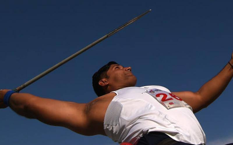 Para-athlete Neeraj Yadav throwing the javelin from his throwing chair in a file photo