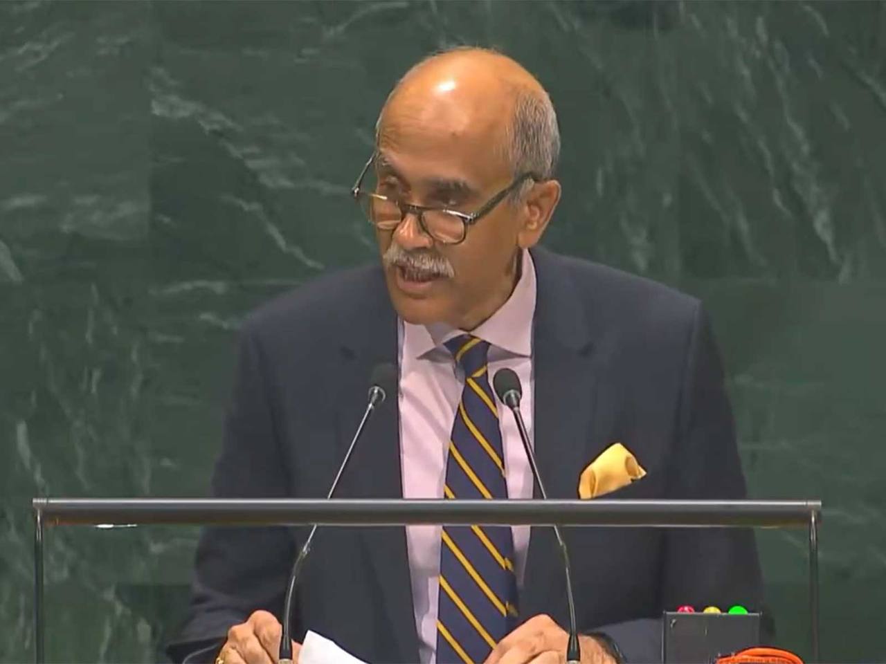 India's Permanent Representative to the UN, Ambassador Parvathaneni Harish, speaking at a podium at the UN General Assembly