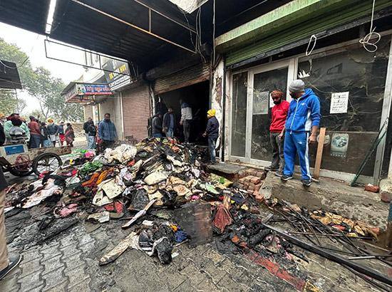 Burnt garments and debris piled outside a fire-damaged shop in Ludhiana (file photo)