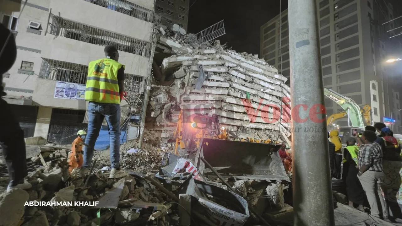 Night rescue operation with excavators and emergency teams at the collapsed building in Eastleigh, Nairobi
