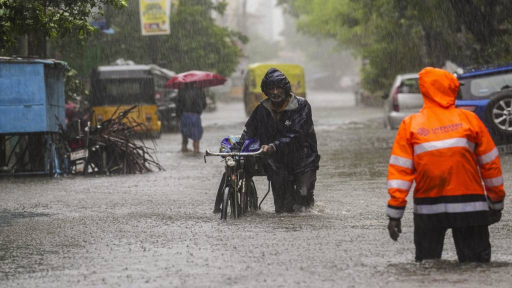File photo of heavy monsoon rain and a waterlogged street in Tamil Nadu