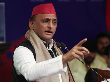 Samajwadi Party chief Akhilesh Yadav speaking to reporters