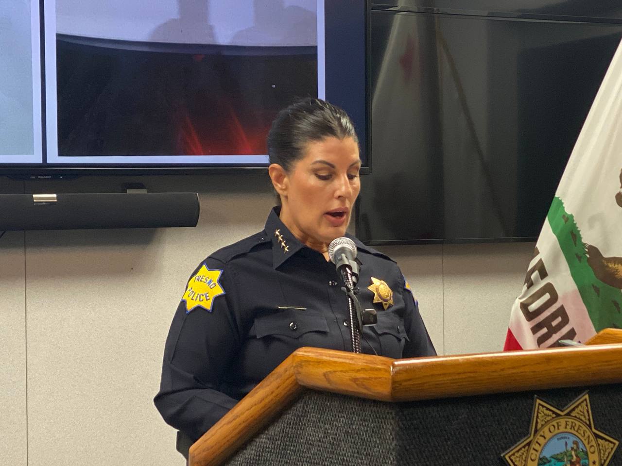Fresno Police Chief Mindy Casto reading a statement at an October 27 2026 news conference at Fresno police headquarters