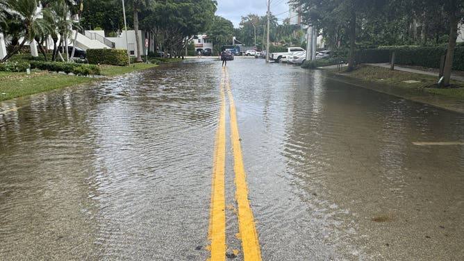 King Tide flooding in Fort Lauderdale, Florida, on October 26, 2026, with seawater covering a coastal street