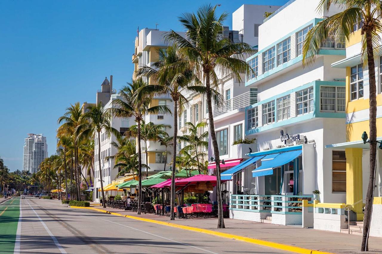 File photo of Ocean Drive in South Beach, Miami Beach, with Art Deco hotels and palm trees in daylight