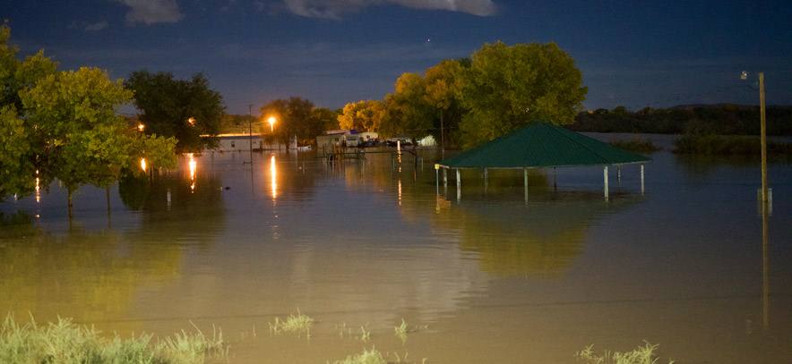 Floodwaters covering Nizhoni Park in Shiprock, New Mexico, on Saturday night, October 24, submerging a pavilion and trees
