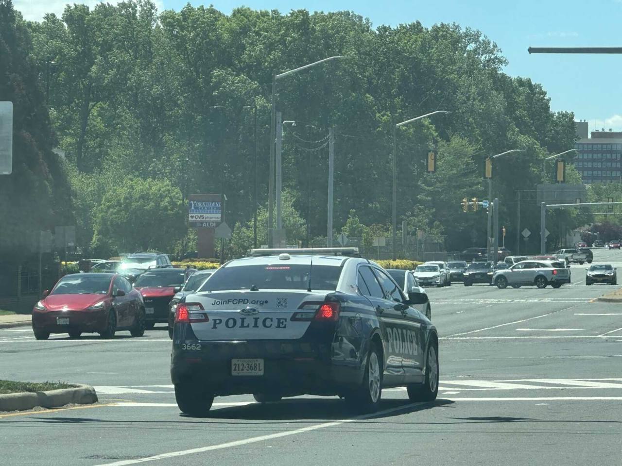 A Fairfax County police cruiser on Gallows Road near Yorktowne Center in Merrifield, Virginia